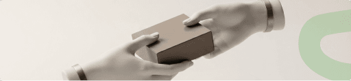 A carefully wrapped wellness gift being passed between two people